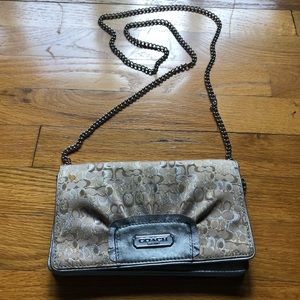 COACH gold clutch purse
